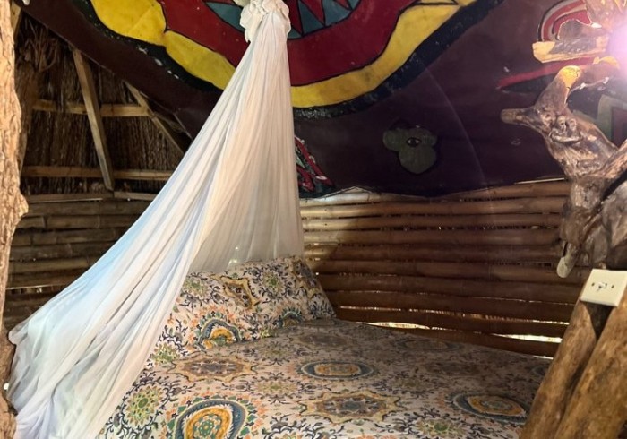 Couple enjoying private picnic on the cliffs at Great Huts romantic wellness escape