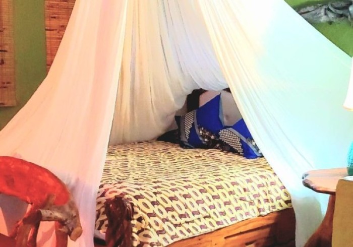 Couple enjoying private picnic on the cliffs at Great Huts romantic wellness escape