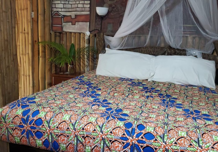 Couple enjoying private picnic on the cliffs at Great Huts romantic wellness escape